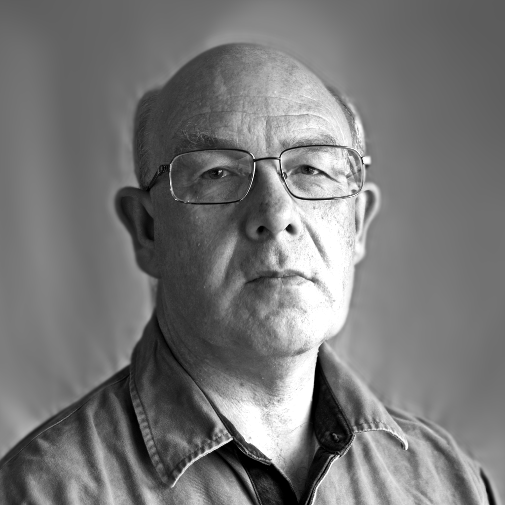 The Curator of this site, monochrome head-shot